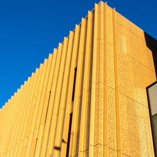 Coventry University Faculty of Arts and Humanities building Gold Perforated Rainscreen Cladding