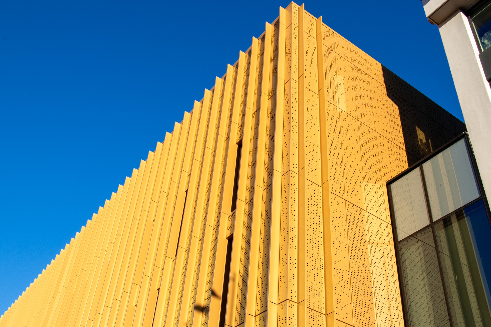 Coventry University Faculty of Arts and Humanities building Gold Perforated Rainscreen Cladding